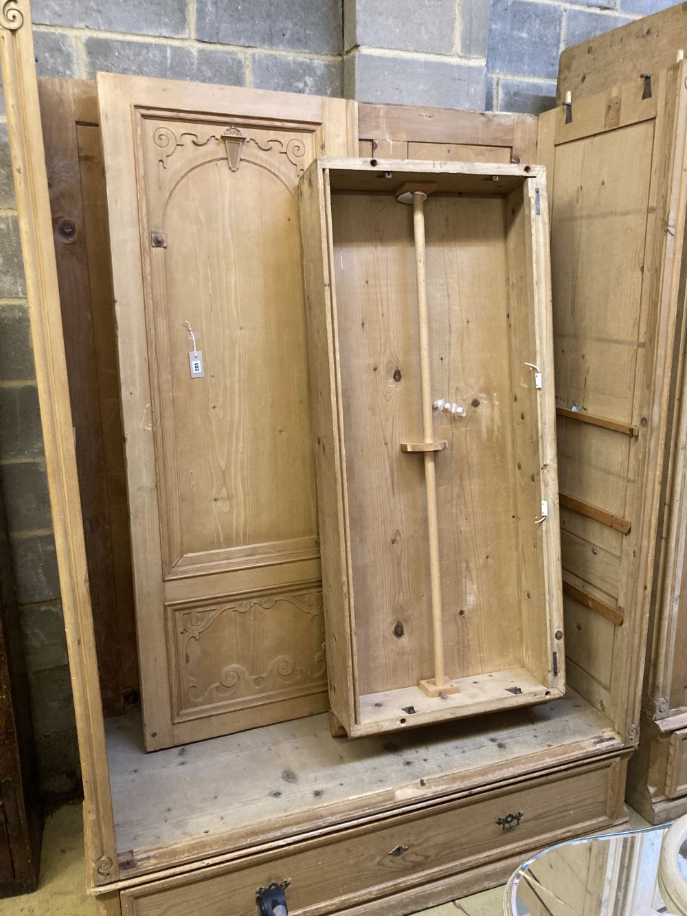 A 19th century French pine two door knockdown wardrobe with drawer and base, width 158cm depth 66cm height 234cm